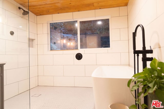 bathroom featuring vanity, plus walk in shower, and wooden ceiling