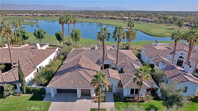 bird's eye view featuring a water and mountain view