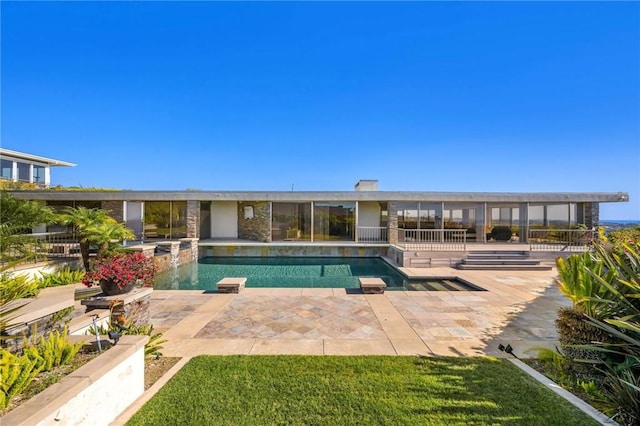 view of swimming pool featuring a patio area