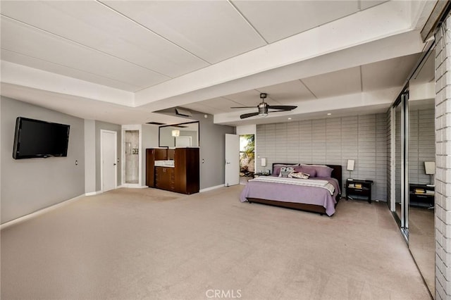 bedroom featuring ceiling fan and light carpet