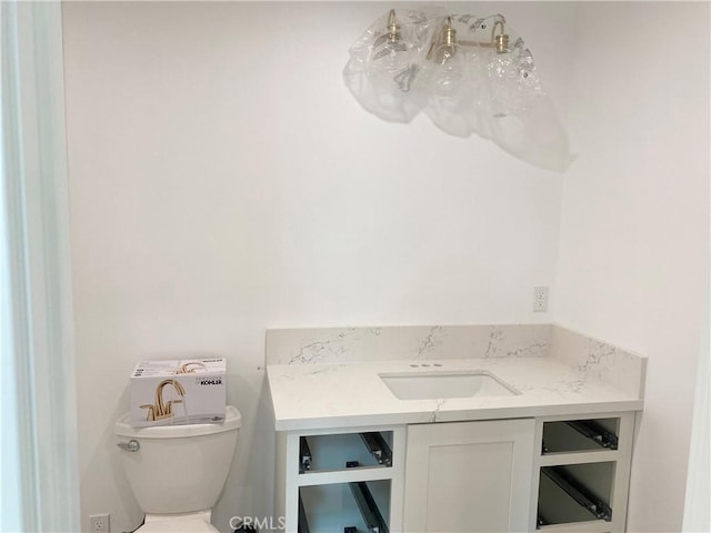 bathroom featuring sink and toilet