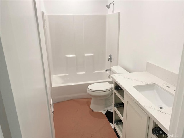 full bathroom with bathtub / shower combination, vanity, and toilet