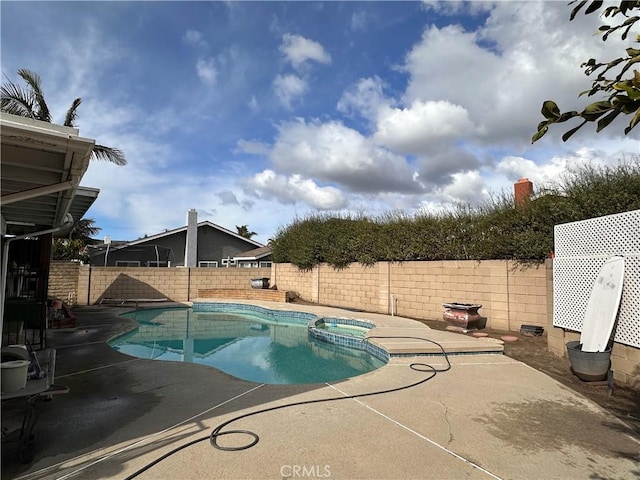 view of pool featuring a patio area