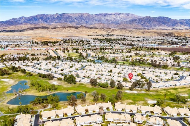 aerial view with a water and mountain view