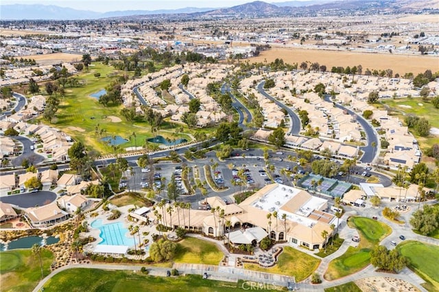 birds eye view of property featuring a mountain view