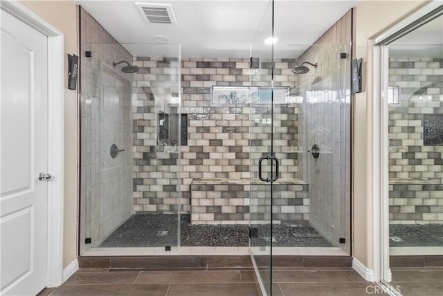 bathroom with an enclosed shower