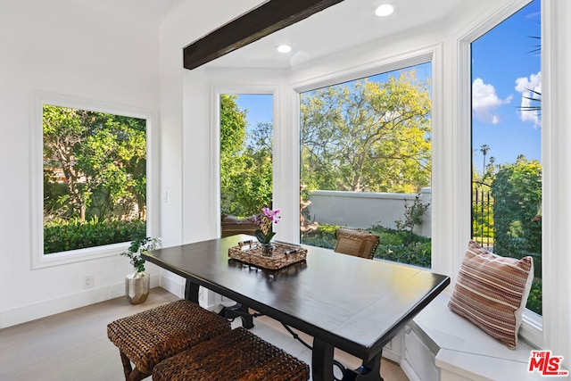 sunroom / solarium with beamed ceiling