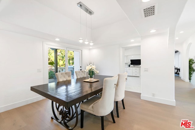 dining room featuring light wood-type flooring