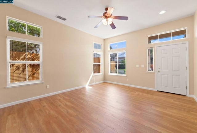 entrance foyer featuring ceiling fan and light wood-type flooring