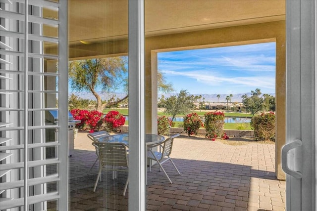 entryway featuring a water view