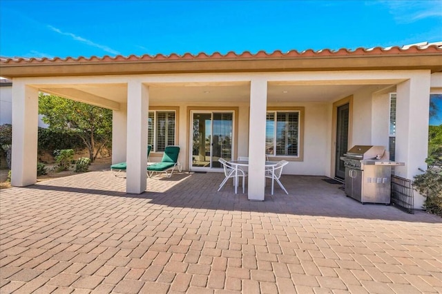 view of patio / terrace with a grill