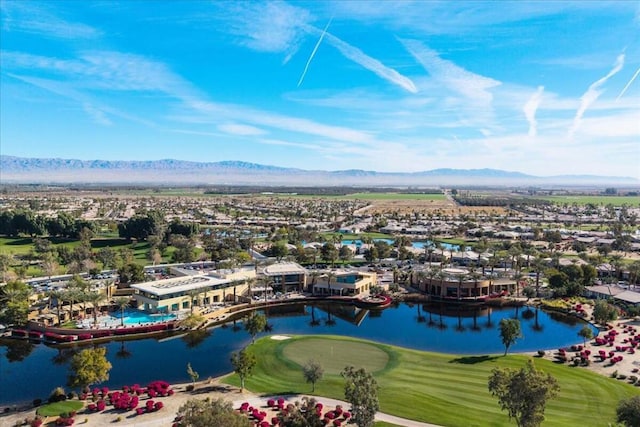 bird's eye view with a water and mountain view