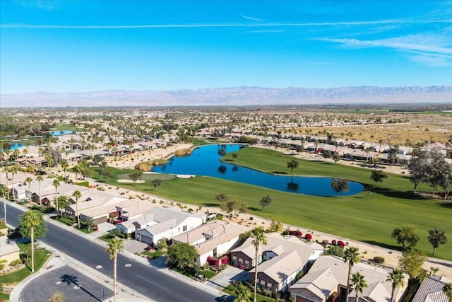 bird's eye view with a water and mountain view