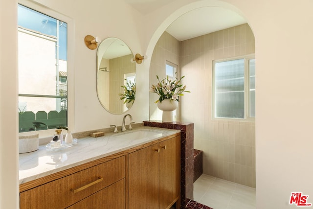 bathroom with vanity and tile patterned flooring