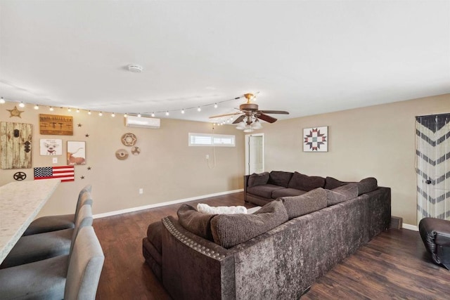 living room with an AC wall unit, dark hardwood / wood-style floors, and ceiling fan