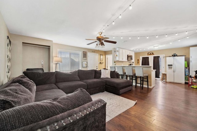 living room with dark hardwood / wood-style floors