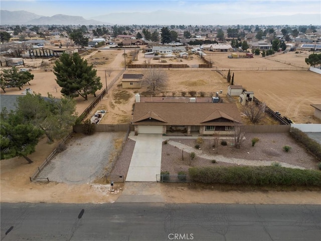 drone / aerial view featuring a mountain view