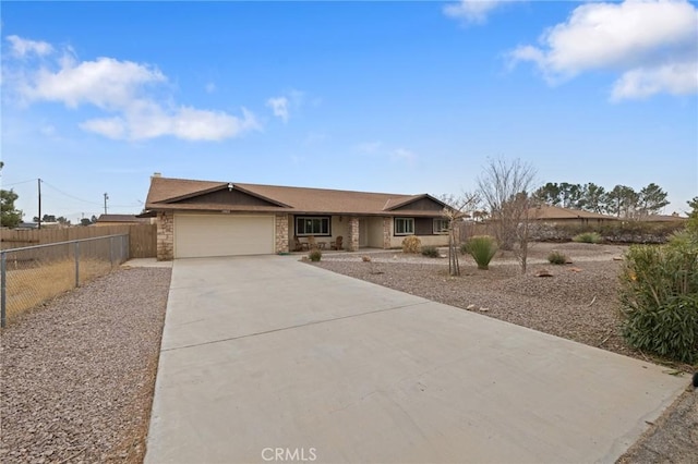 ranch-style home featuring a garage