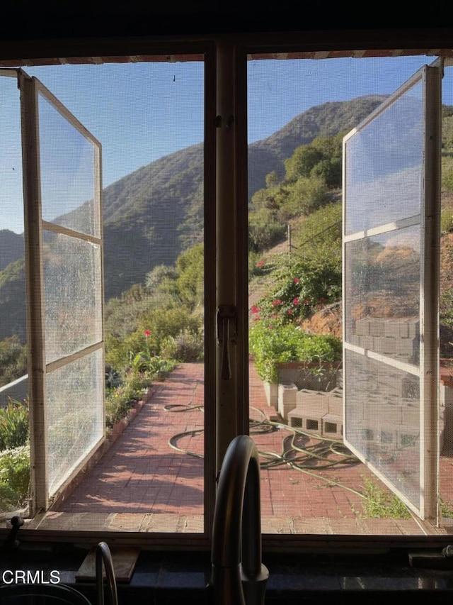 interior space with a mountain view