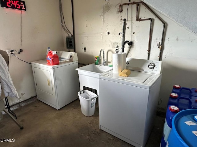 laundry area with independent washer and dryer