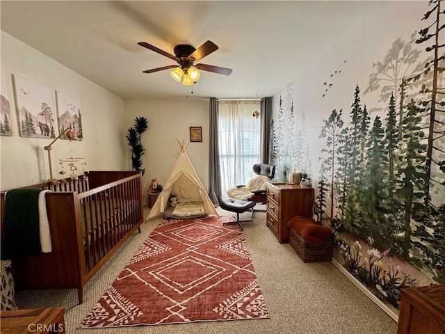 carpeted bedroom featuring ceiling fan