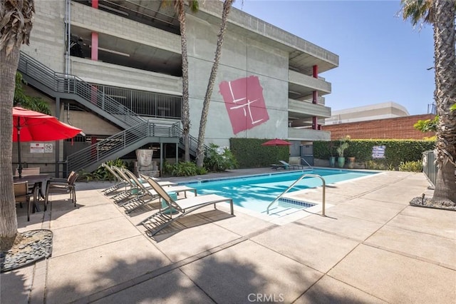 view of pool with a patio area