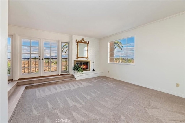 interior space with a brick fireplace and french doors