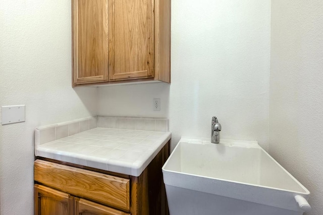 kitchen with sink and tile counters