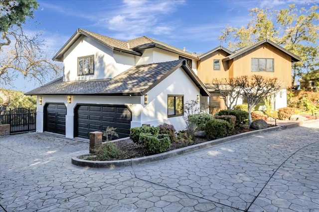 front of property with a garage