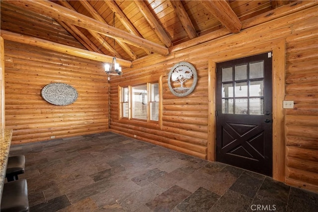 entryway with high vaulted ceiling, wooden ceiling, stone finish flooring, log walls, and beamed ceiling