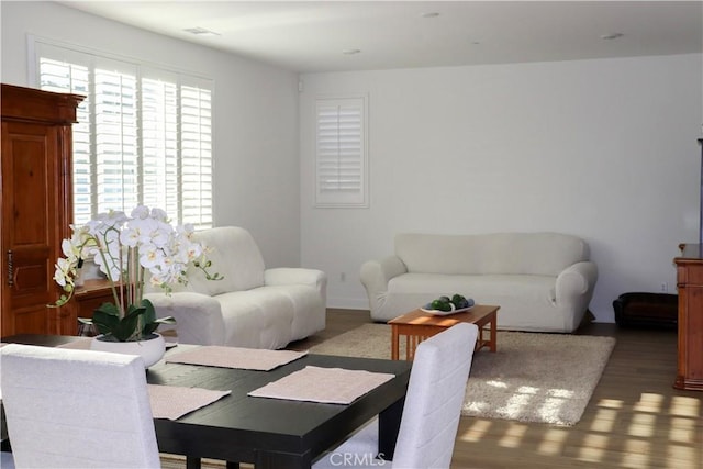 living room featuring dark hardwood / wood-style flooring