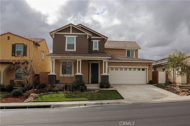 view of front of property with a garage