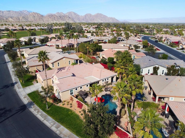 drone / aerial view featuring a mountain view