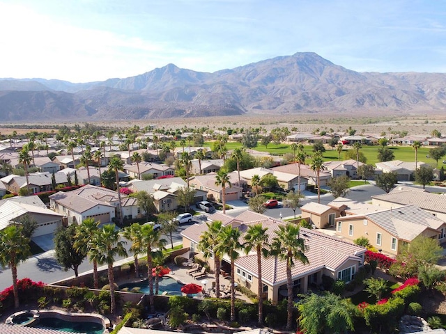 drone / aerial view featuring a mountain view