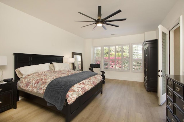 bedroom featuring ceiling fan and light wood-type flooring