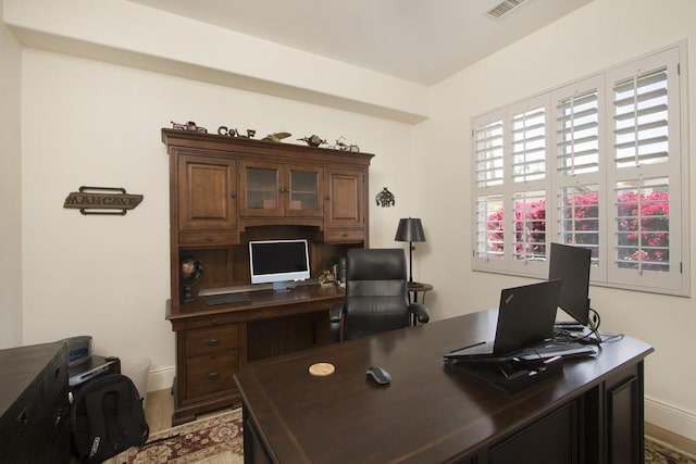 office area with light hardwood / wood-style flooring