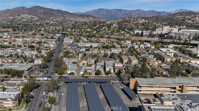 drone / aerial view featuring a mountain view