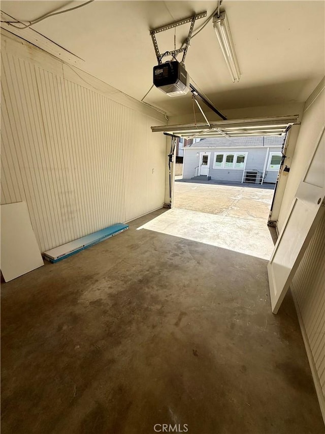 garage featuring a garage door opener