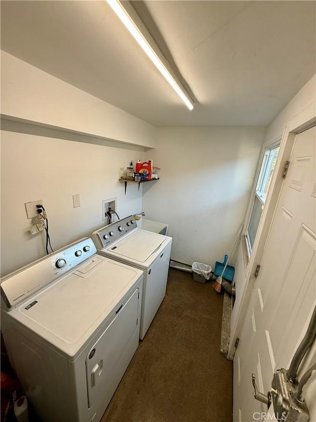 laundry area with washing machine and clothes dryer