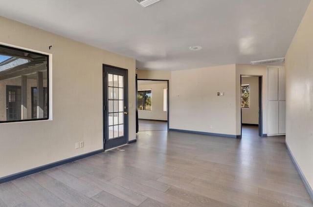 empty room featuring hardwood / wood-style flooring