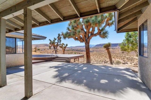 view of patio with a mountain view