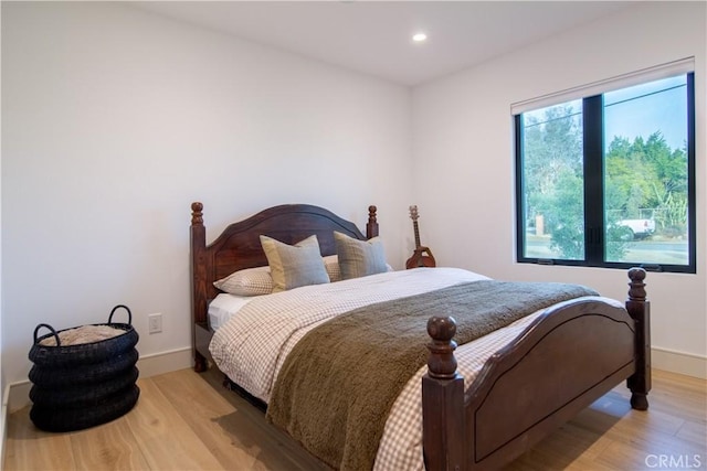 bedroom featuring light wood-type flooring