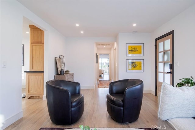 living area with light wood-type flooring