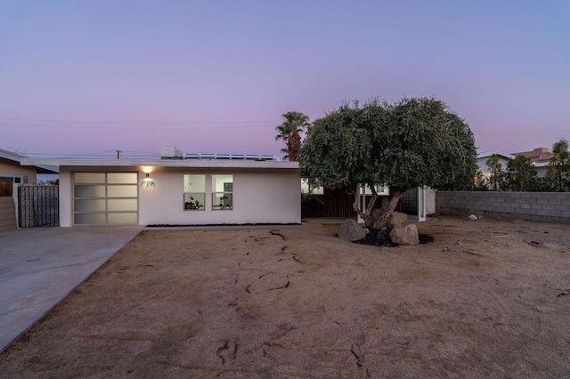 ranch-style home with a garage