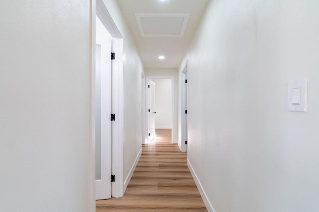 corridor featuring light hardwood / wood-style flooring