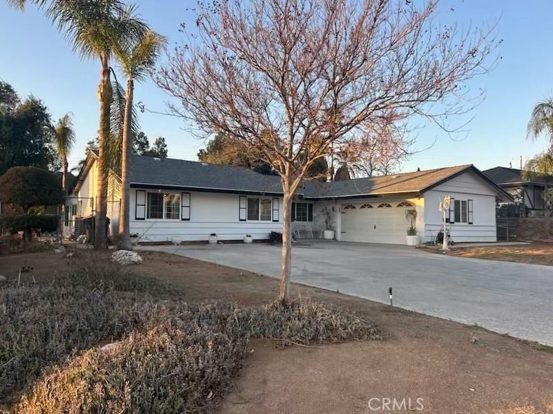 single story home with a garage