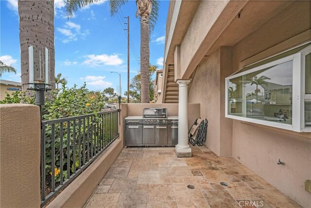 balcony featuring a grill