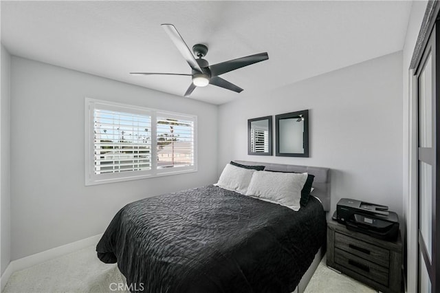 bedroom featuring ceiling fan and carpet flooring