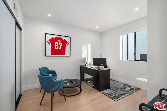 office featuring hardwood / wood-style floors