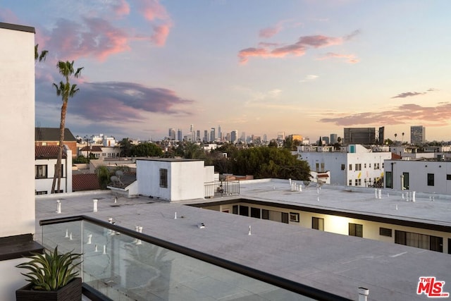 view of balcony at dusk